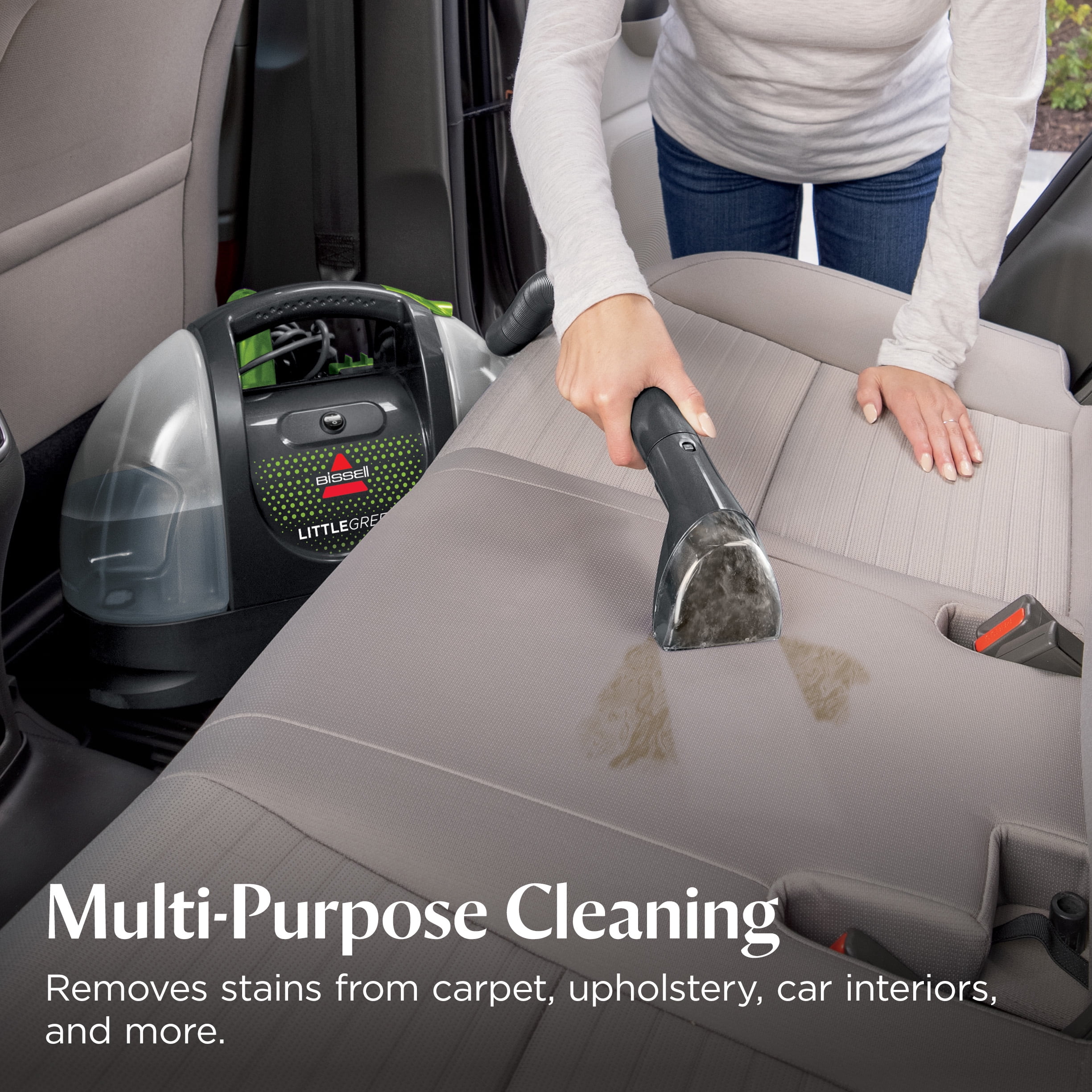 BISSELL product photo showing the Little Green cleaning a car seat