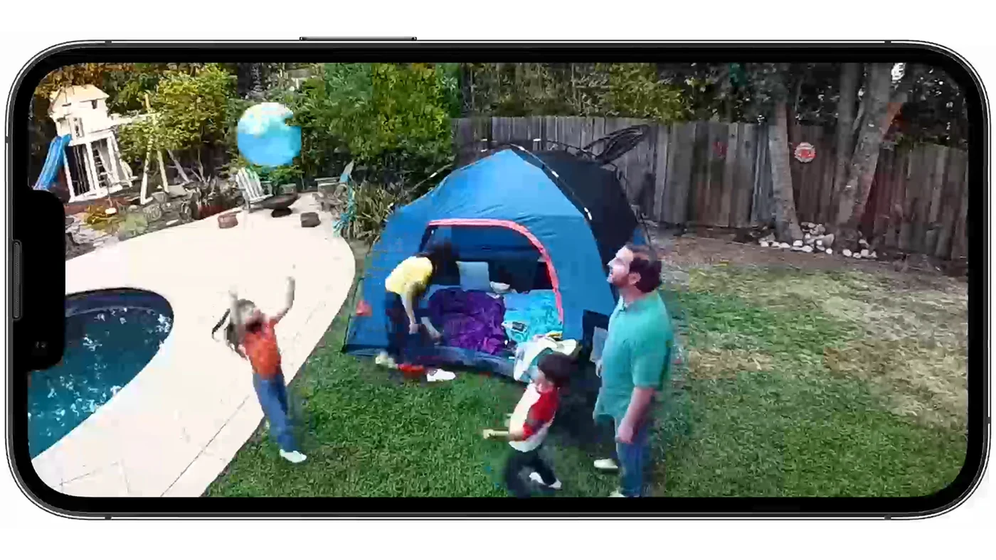 Ring camera Live View shown on a phone monitoring a backyard