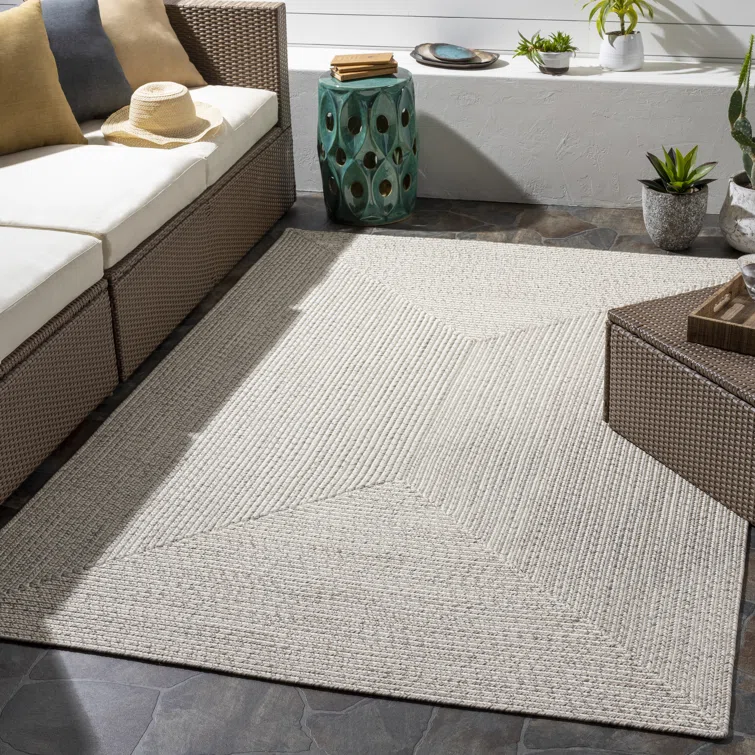 Leroux Cream indoor outdoor area rug, 80% off at Wayfair